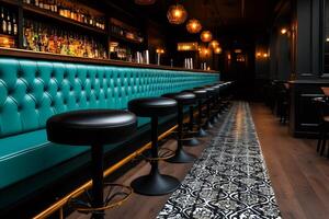 Luxurious teal banquette seating and stools in upscale bar photo