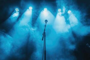 Microphone on stage with dramatic lighting and smoke creating a concert atmosphere photo