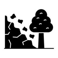 A solid design icon of landslide graphics vector