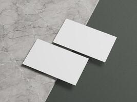 Modern business card mockup with two white cards positioned in a minimalistic layout on a marble surface. photo