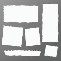 Collection of Torn White Paper Pieces on Gray Background Different Shapes and Sizes for Design Elements vector