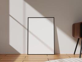 A minimalist black photo frame standing against a light wall, casting shadows on wooden flooring, perfect for showcasing artwork or photography.