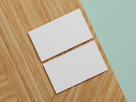 Top view of blank business cards on a wooden surface, ideal for branding presentations or portfolio displays. photo