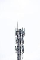 A cell phone tower with multiple antennas photo
