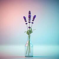 A single lavender stem in a clear glass bottle with a soft pastel gradient background, capturing a sense of calmness and elegance photo