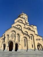 Ornate Facade of a Georgian Cathedral Against a Clear Sky photo