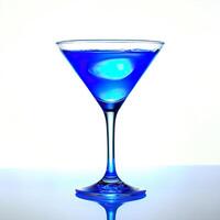 A blue drink in a glass photo