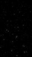 Bright shiny twinkling stars moving across the night sky. This glittering starry night vertical background is full HD and a seamless loop. video