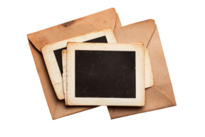 Collection of vintage photographs in brown envelopes with empty frames png