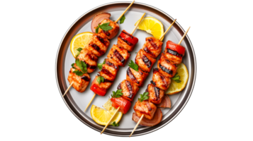 Grilled meat skewers on plate with lemon, isolated, cut out transparent png