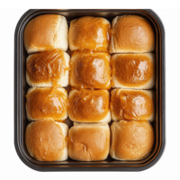 Freshly Baked Golden Dinner Rolls in a Rectangular Pan with Delicious Glaze png