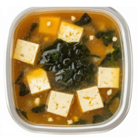Square Container of Delicious Tofu Seaweed Soup with Broth and Cubes on Transparent Background png