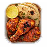 Delicious Grilled Chicken Drumsticks with Lemon and Fresh Naan Bread in Takeout Container png