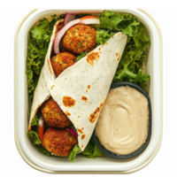 Fresh Falafel Wrap with Lettuce and Tahini Sauce in Takeout Container for Healthy Eating png