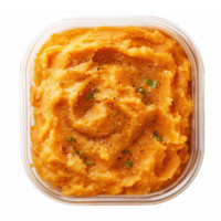 Creamy Mashed Sweet Potatoes with Seasoning in Clear Container Ready for Serving png