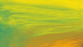 Vibrant yellow and green abstract brushstroke texture with dynamic motion. Artistic background concept video