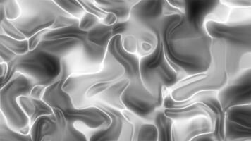 Sleek metallic wave pattern in grayscale with reflective texture video