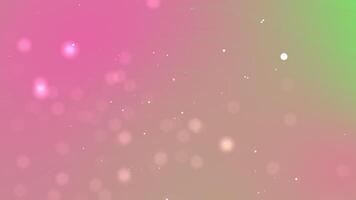 Soft pink gradient blends into green with glowing bokeh lights. Abstract background concept video