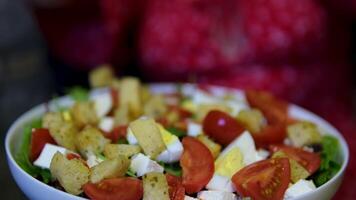 add croutons to Caesar salad with boiled egg, tomatoes, herbs and feta cheese video