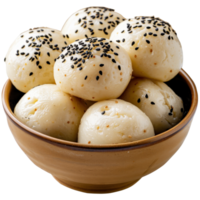 Soft Steamed Dumplings with Black Sesame Seeds in a Brown Clay Bowl on . png