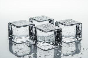 Close-Up View of Transparent Ice Cubes with Bubbles on Clean White Background photo