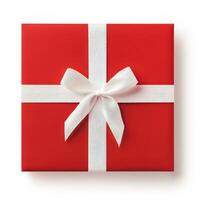 Red gift box with white ribbon and bow isolated on white background photo