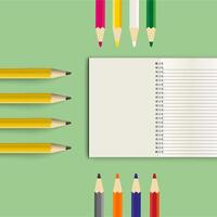 PA spiral notebook with blank and lined pages sits on a green background vector