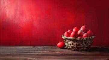 Vibrant Red Easter Eggs in Basket on Red Background photo