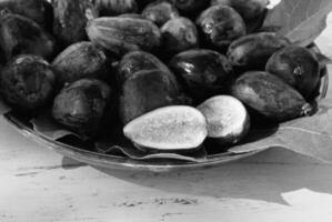 Figs on a plate and dinner table close view background creative background photo