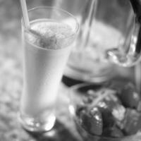Strawberry milkshake close view background creative background photo