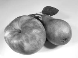 Close Up of Apple and Pear on White Background creative background photo