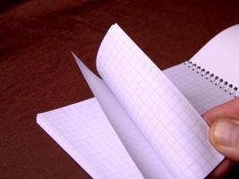 Blank pages of a notebook close view background creative wallpaper photo