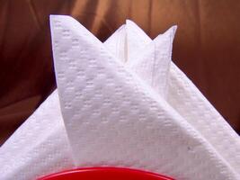 White napkins on a table close view wallpaper photo