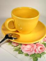 A cup of coffee on a table close view background Version 23 photo
