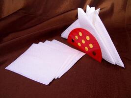 White napkins on a table close view for different design purposes photo