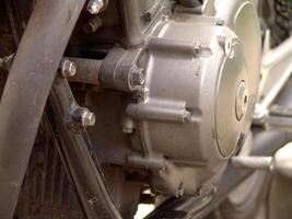 Close up of a Motorcycle Engine Block and Transmission Components wallpaper photo