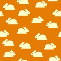 Seamless background with bunnies vector