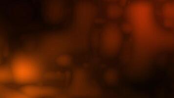 Abstract orange and black background with a blurry image video