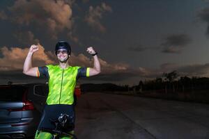 Triathlete in professional gear running early in the morning, preparing for a marathon, dedication to sport and readiness to take on the challenges of a marathon. photo