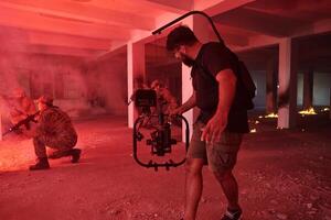 A professional cameraman captures the intense moments as a group of skilled soldiers embarks on a dangerous mission inside an abandoned building, their actions filled with suspense and bravery photo