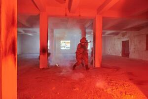 A group of professional soldiers bravely executes a dangerous rescue mission, surrounded by fire in a perilous building. photo