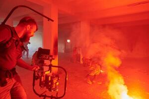 A professional cameraman captures the intense moments as a group of skilled soldiers embarks on a dangerous mission inside an abandoned building, their actions filled with suspense and bravery photo