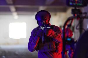 A professional cameraman captures the intense moments as a group of skilled soldiers embarks on a dangerous mission inside an abandoned building, their actions filled with suspense and bravery photo