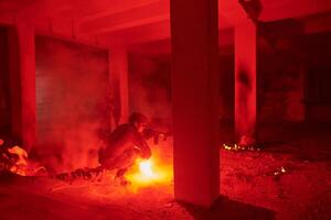 A professional cameraman captures the intense moments as a group of skilled soldiers embarks on a dangerous mission inside an abandoned building, their actions filled with suspense and bravery photo
