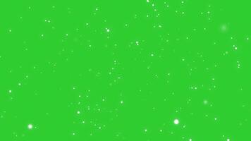 Abstract background with futuristic particles flowing towards camera on green background. Glowing dots. seamless loop video