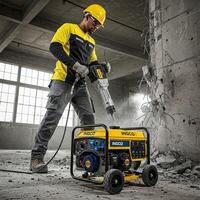 A man in yellow shirt and hard hat using a portable generator photo