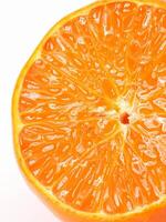 Slice of oranges, showcasing various types such as mandarin oranges, valencia oranges, and clementines. These fruits are part of the citrus family and are known for their vibrant color. photo