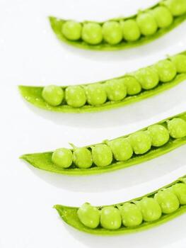close-up view of a bunch of green beans. These vegetables are part of the legume family and can be categorized as produce, specifically snap peas and snow peas. photo