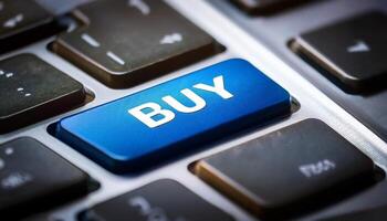 Close-up View of a Computer Keyboard With a Prominent Blue Buy Key Highlighting the Act of Online Shopping and Digital Transactions photo
