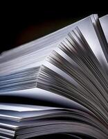 Close-up of an Open Book Showcasing Its Crisp, White Pages Under Soft Lighting at Dusk photo